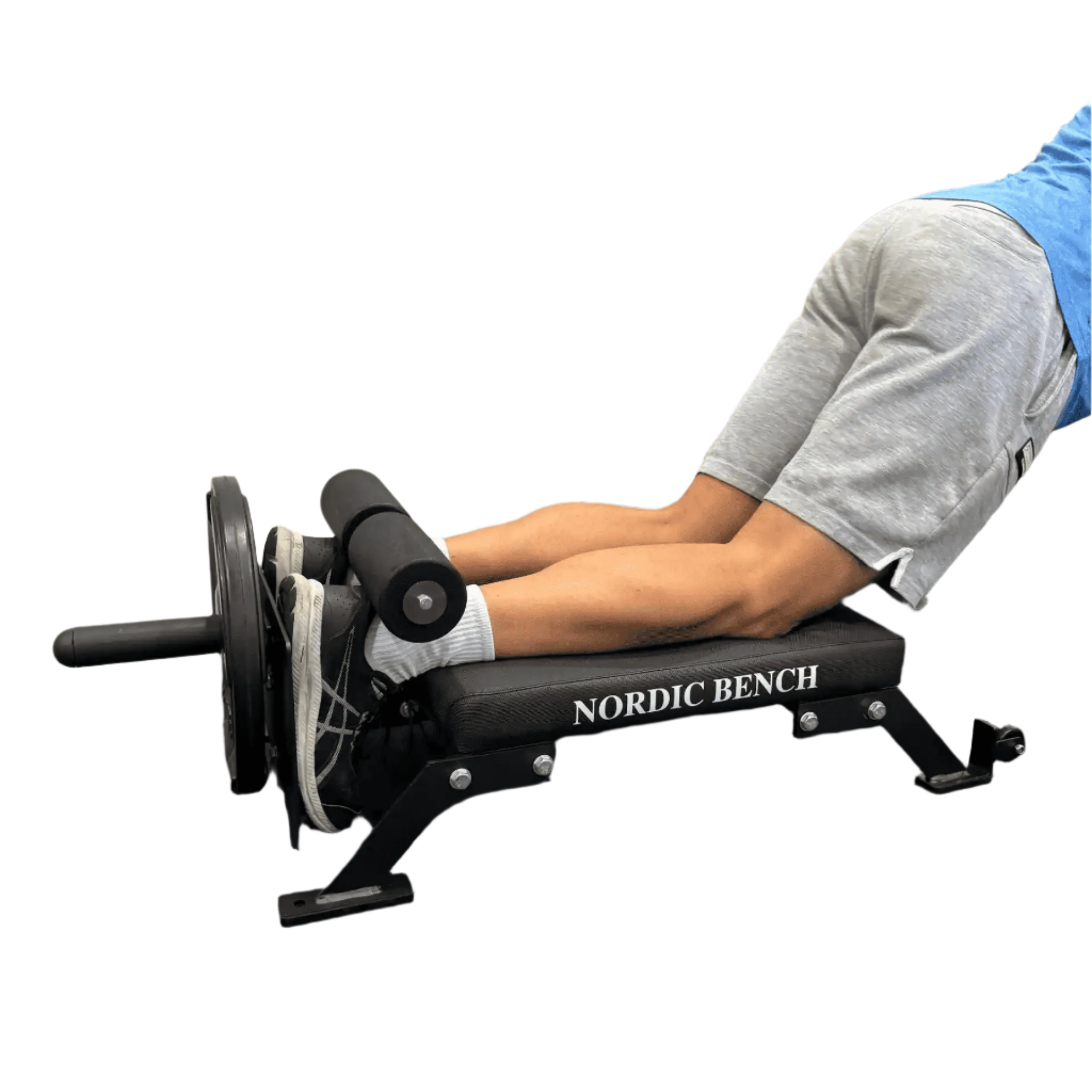 A person performing an exercise on a Nordic Bar bench in a gym, highlighting the equipment and workout form. No background.