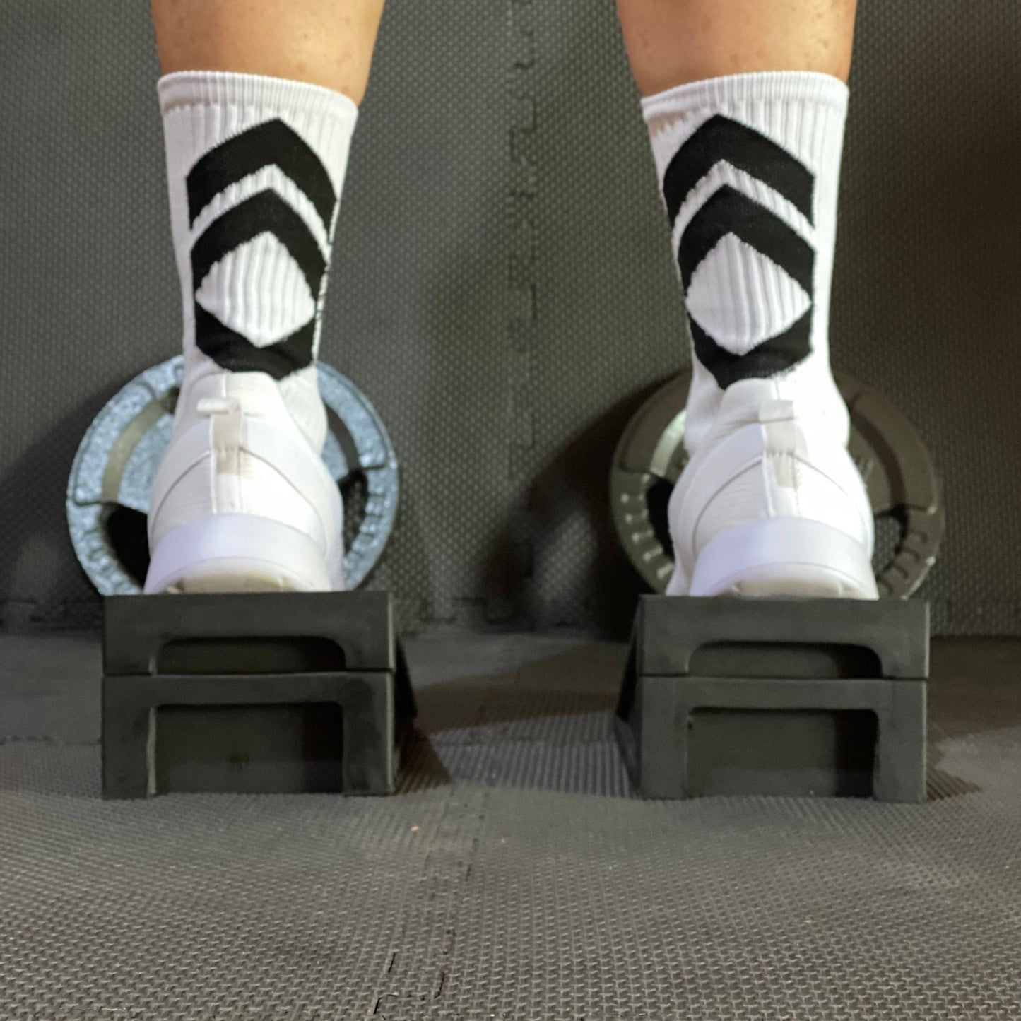 Squat Wedge - The Tib Tool, Tib Bar, Kneesovertoesguy, knee rehab, plantar fasciitis, tib raises, slant board, ankle mobility, tib bar, tibialis, shin splints, knees over toes guy, knee rehab, tib tool, athletic truth group, ATG, tib trainer, squat wedge, slantboard