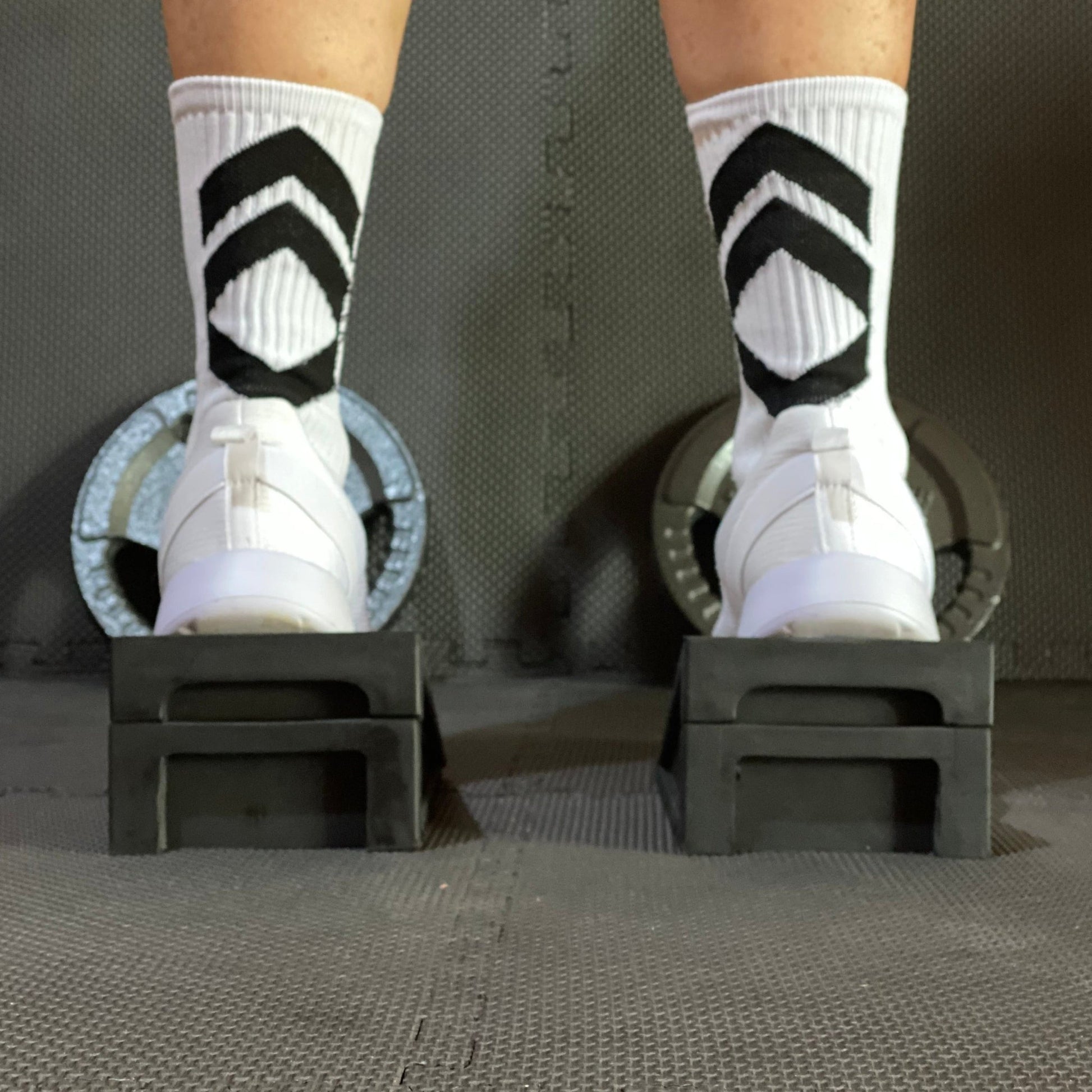 Squat Wedge - The Tib Tool, Tib Bar, Kneesovertoesguy, knee rehab, plantar fasciitis, tib raises, slant board, ankle mobility, tib bar, tibialis, shin splints, knees over toes guy, knee rehab, tib tool, athletic truth group, ATG, tib trainer, squat wedge, slantboard