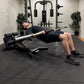 Person using a weight bench in a gym setting