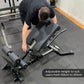 Person adjusting a back extension machine in a gym setting with text indicating adjustable height.