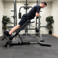 Person using a back extension machine for isometric holds in a gym setting.