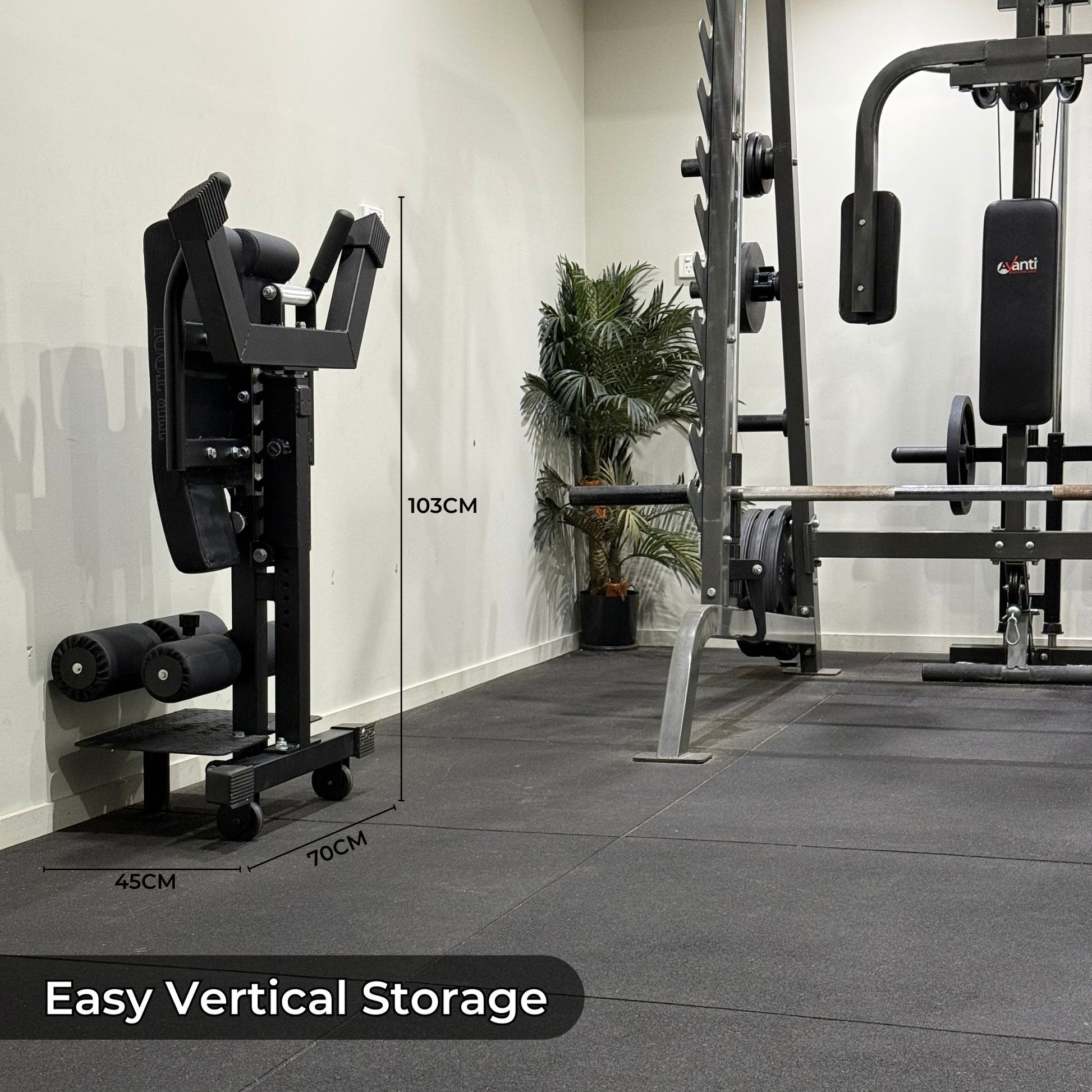 Back extension machine with vertical storage solution labeled 'Easy Vertical Storage' on a gray floor.